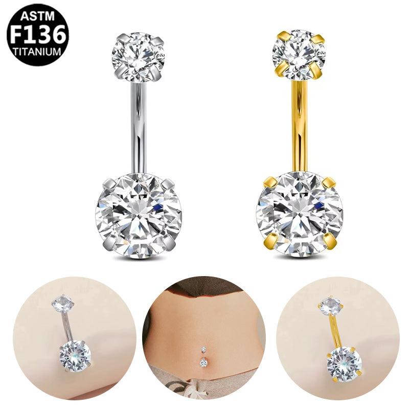 Bauchnabelpiercing und/oder Intimpiercing aus ASTM F136 Titan mit zwei Doppelkristallen in Krabbenfassung, in Silber & Gold aus der ROYAL Essentials Kollektion. 