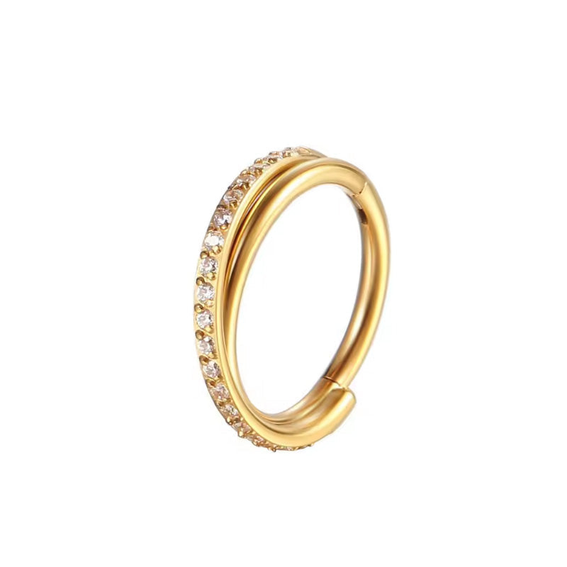 Titan AStm f136 segmentring clicker überkreuzt mit zirkonia steinen eingefasst in gold für Nasen-, Helix-, Conch- Piercing
