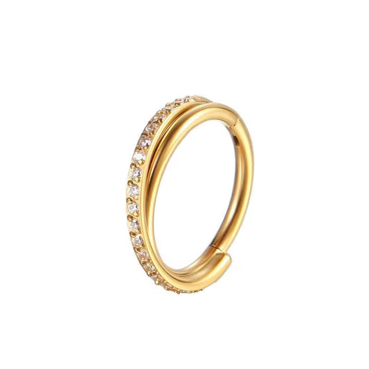 Titan AStm f136 segmentring clicker überkreuzt mit zirkonia steinen eingefasst in gold für Nasen-, Helix-, Conch- Piercing